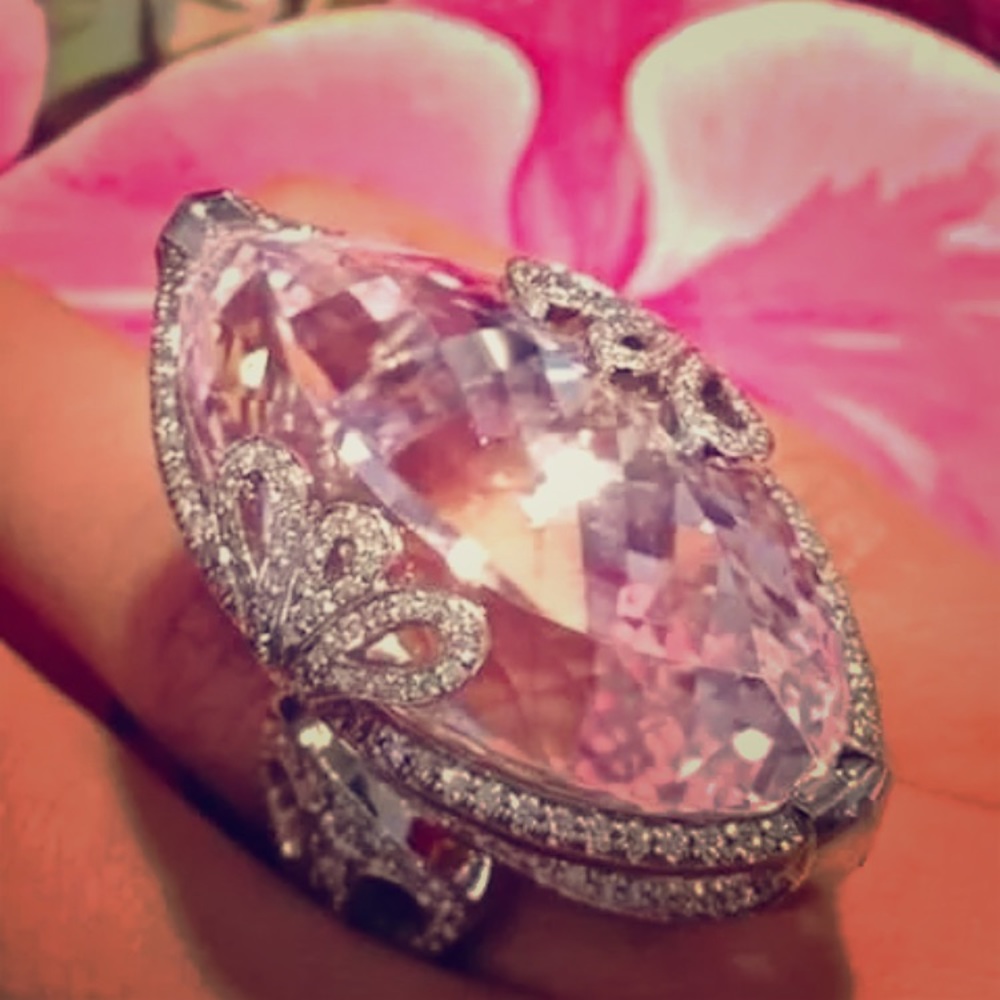 Pink sapphire ring over sterling silver